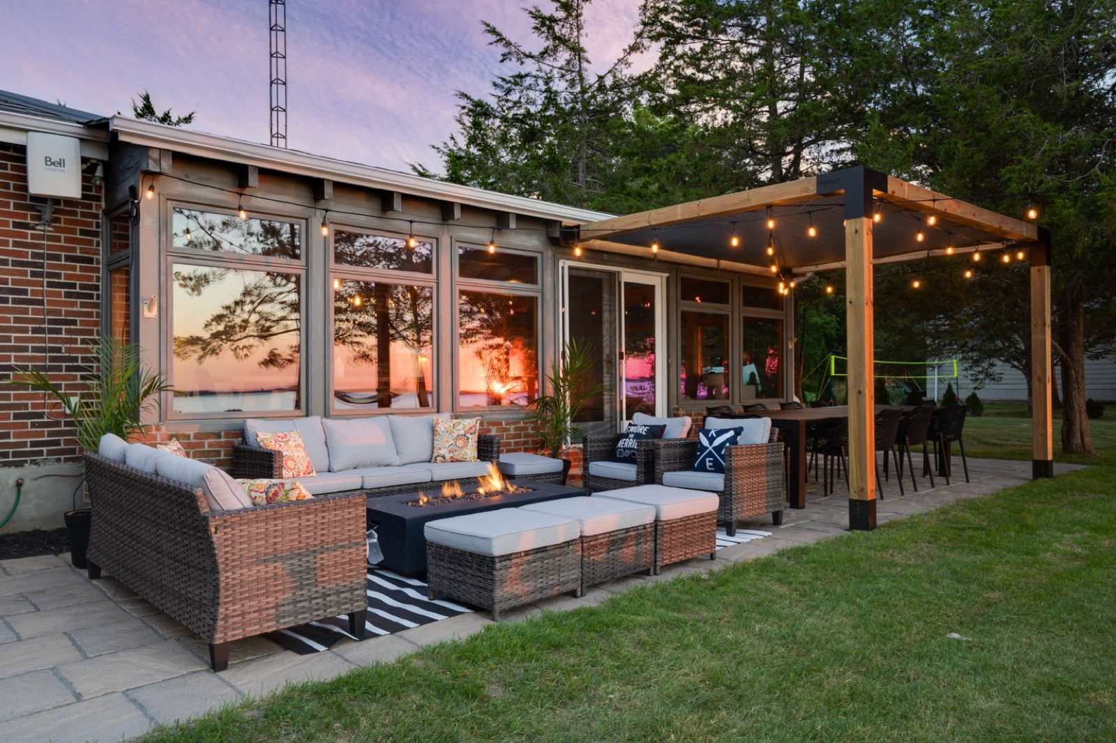 Waterfront patio lounge at golden hour