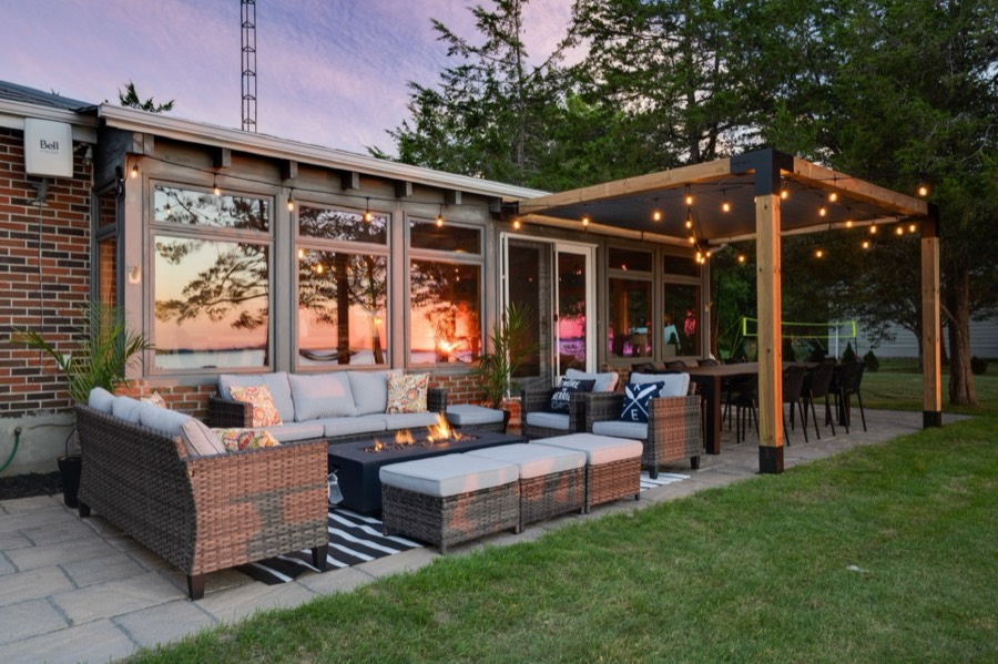 Waterfront patio lounge at golden hour